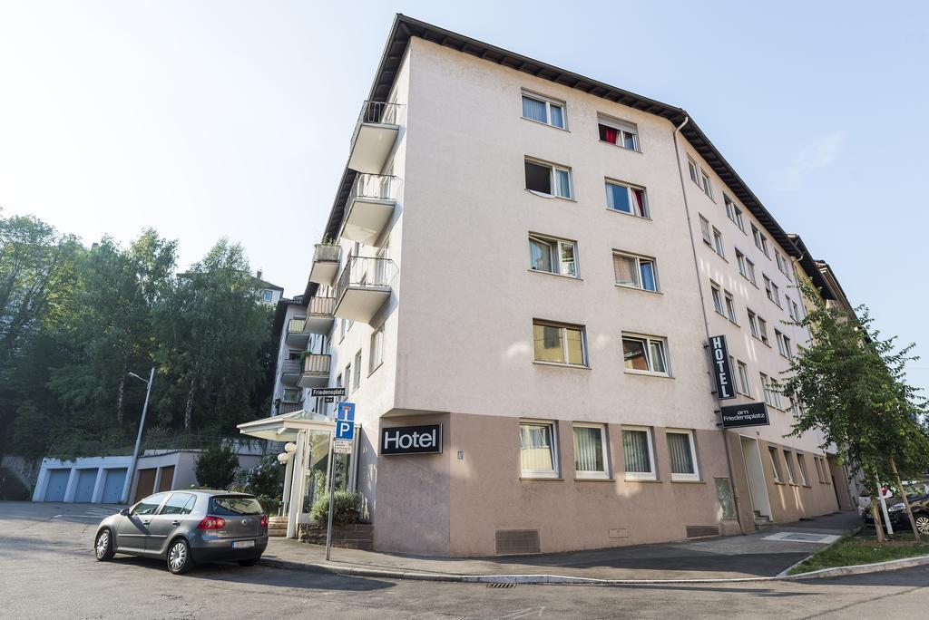 Hotel Am Friedensplatz Estugarda Exterior foto