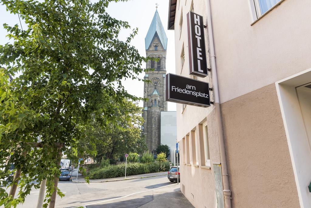 Hotel Am Friedensplatz Estugarda Exterior foto